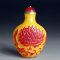 Yellow and red snuff bottle